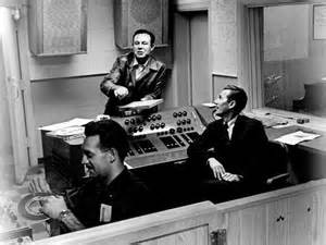 Jim Reeves (center) recording with Chet Atkins (right)