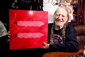 AUSTIN, TX - MARCH 27:  Willie Nelson holds up the Human Rights Campaign marriage equality symbol that has been stylized into two "joints" during an interview on his bus the Honeysuckle Rose on March 27, 2013 in Austin, Texas.  (Photo by Gary Miller/FilmMagic)